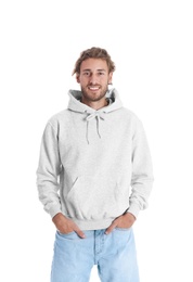 Photo of Portrait of man in hoodie sweater on white background. Space for design