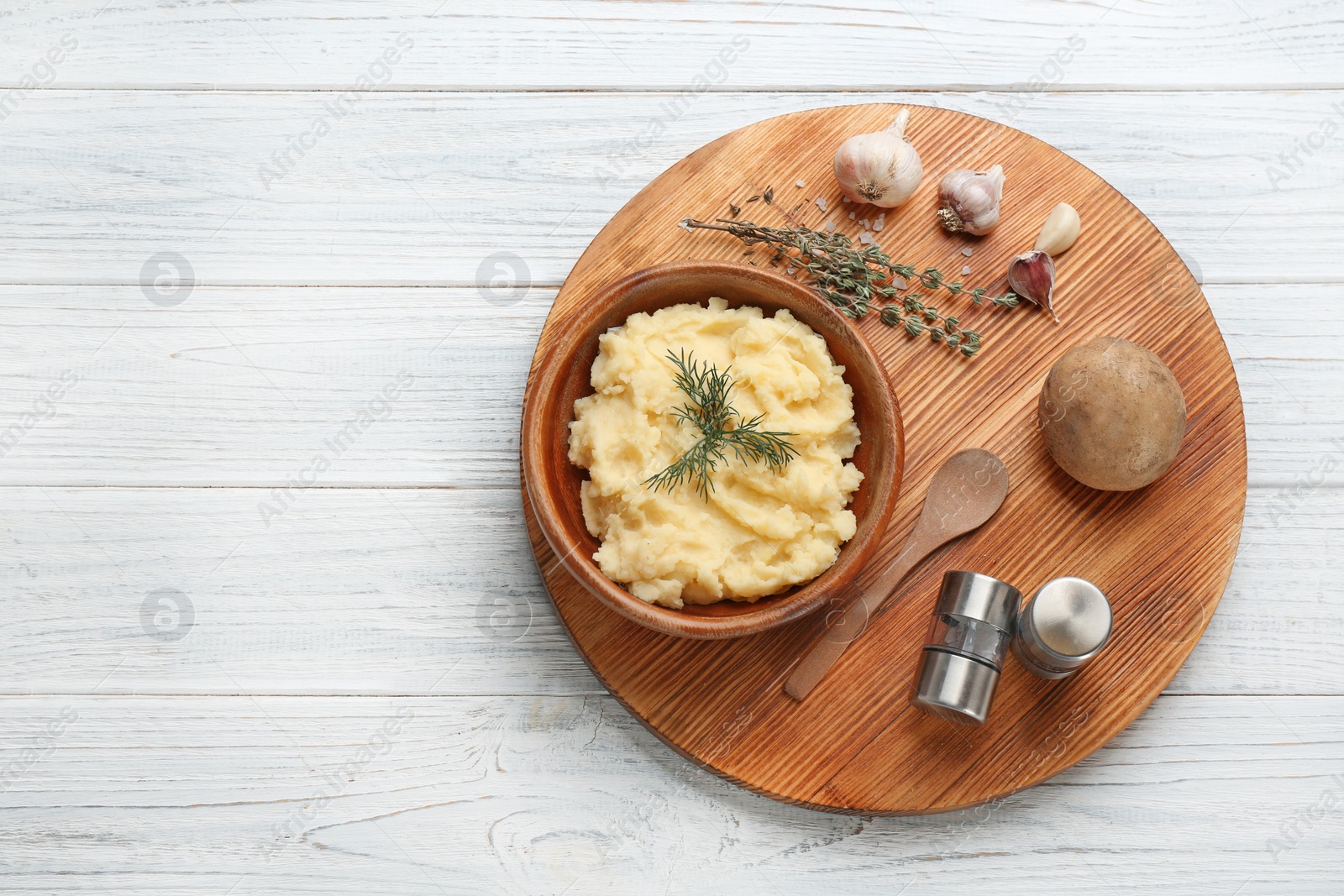 Photo of Flat lay composition with mashed potatoes and space for text on wooden background