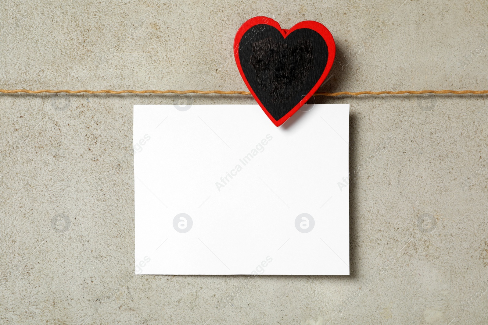 Photo of Blank card on grey background, top view with space for text. Valentine's Day celebration