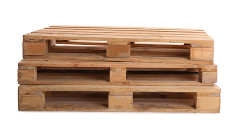 Photo of Stacked wooden pallets isolated on white. Transportation and storage