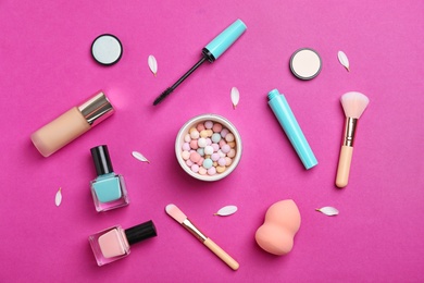 Flat lay composition with cosmetic products on color background