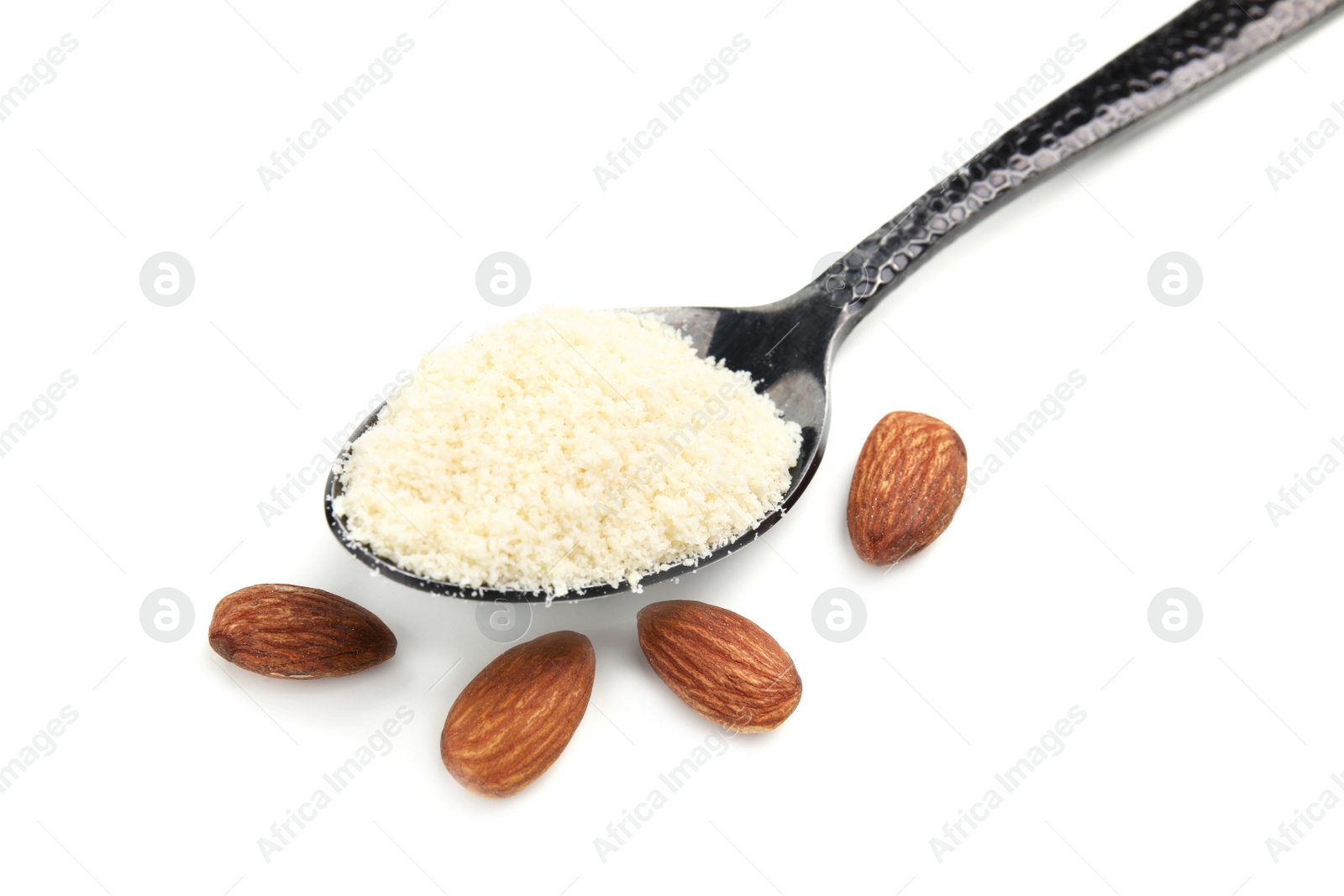 Photo of Spoon of almond flour and nuts on white background