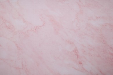 Photo of Texture of pink marble surface as background, closeup