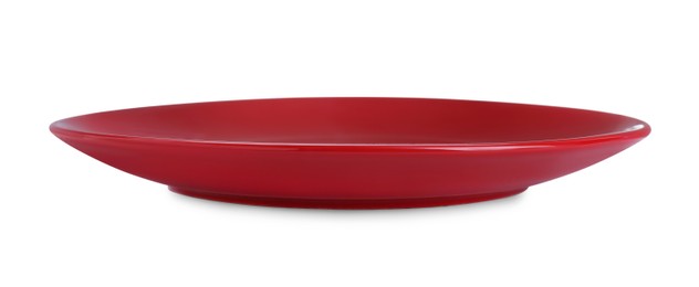 Photo of Empty red ceramic plate isolated on white