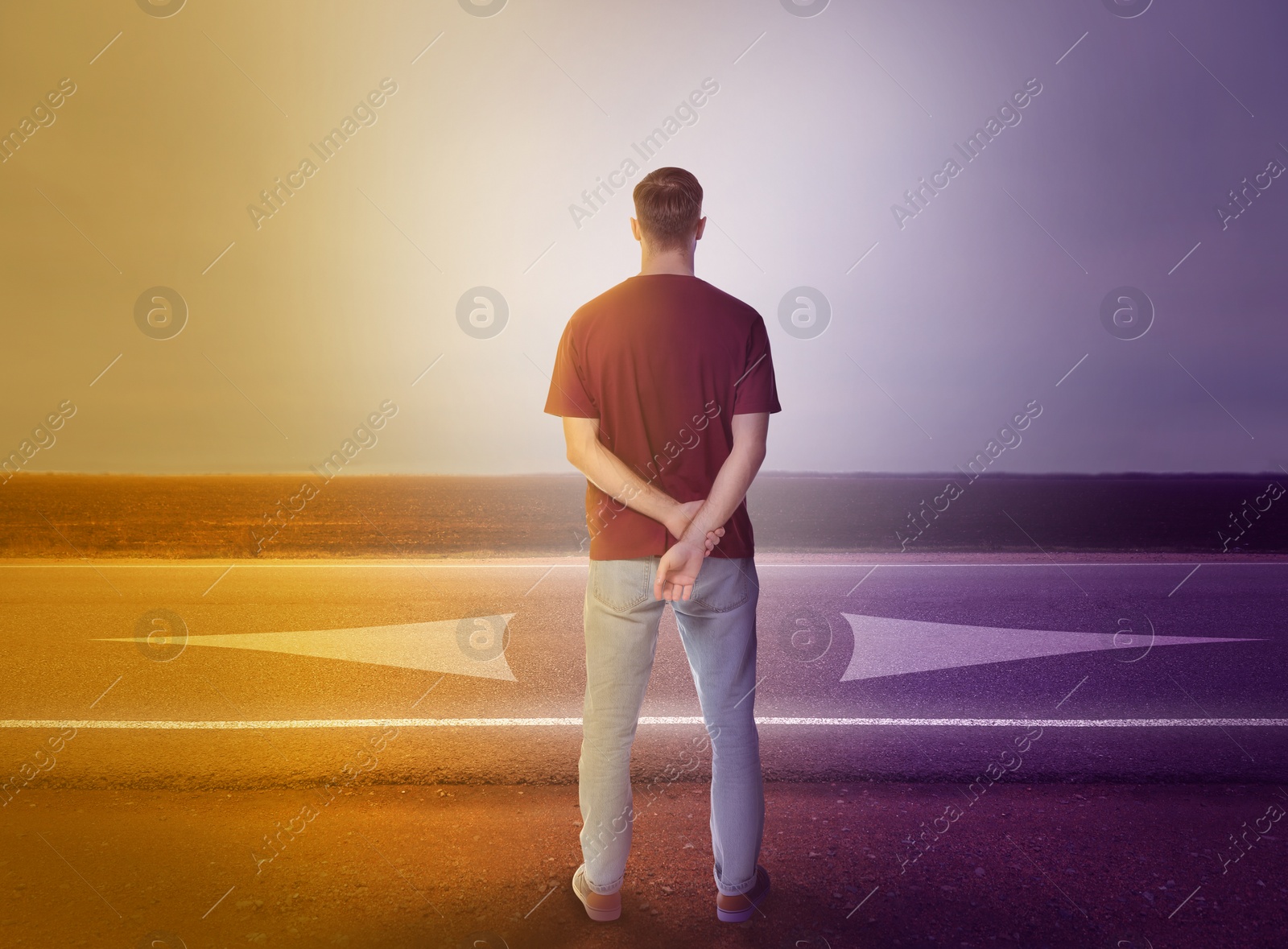 Image of Man standing at crossroads. Concept of choice between different ways 