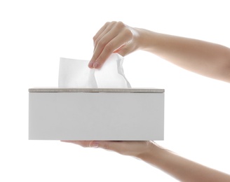 Photo of Woman taking paper tissue from holder on white background, closeup