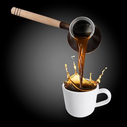 Pouring freshly brewed aromatic coffee from turkish pot into cup. Objects in air on black background