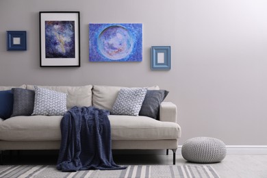 Photo of Comfortable sofa in stylish living room interior