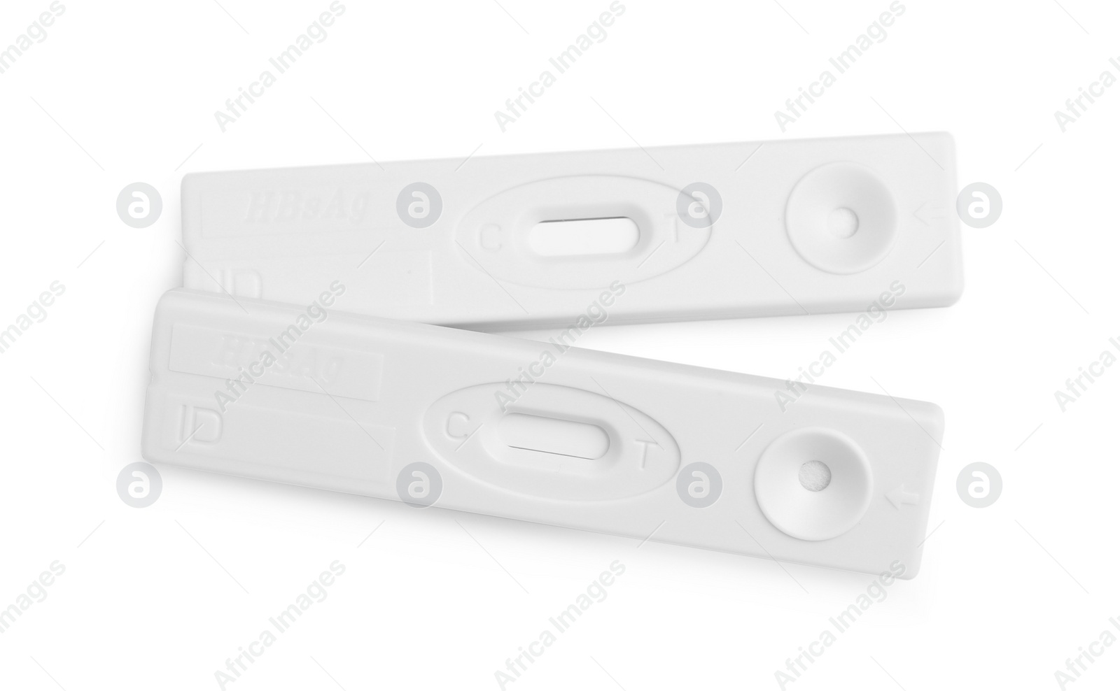 Photo of Two disposable express tests for hepatitis on white background, top view