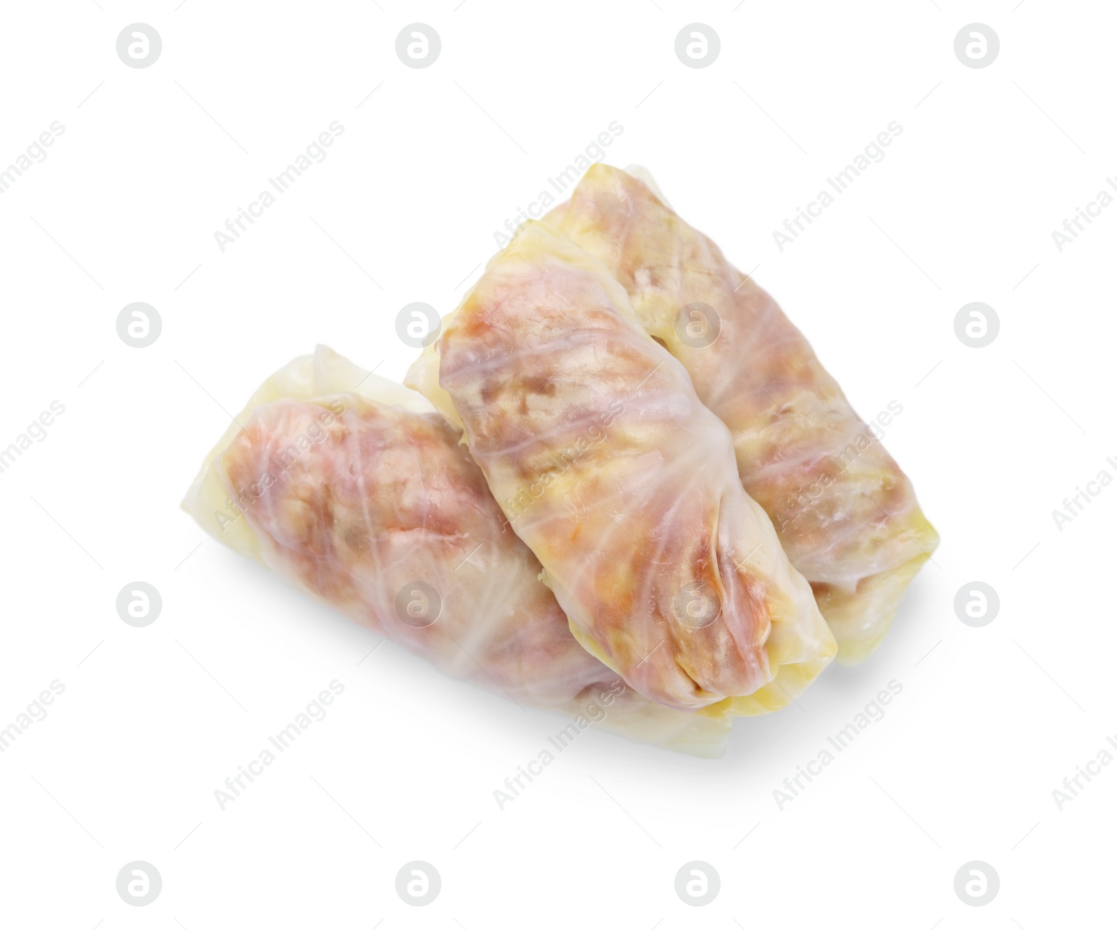 Photo of Uncooked stuffed cabbage rolls isolated on white, top view