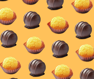 Image of Tasty candies on orange background. Pattern design