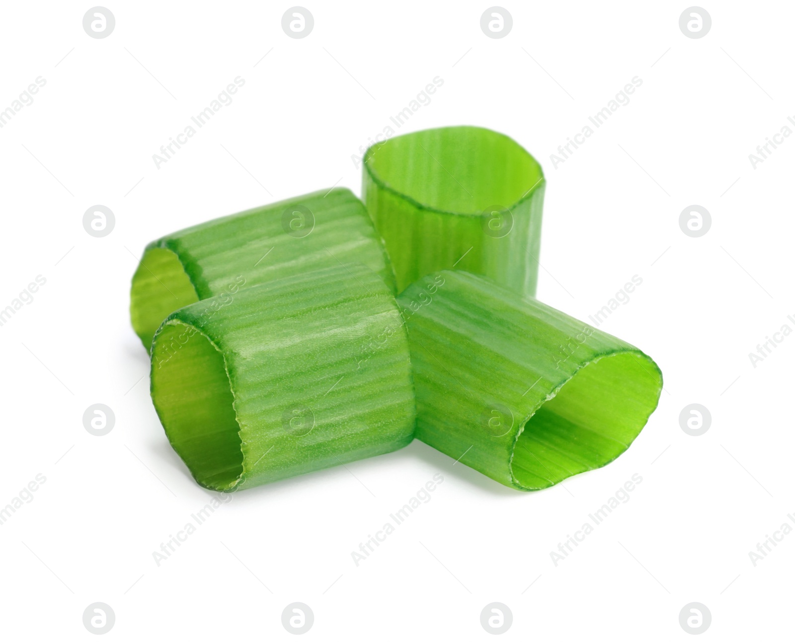 Photo of Pieces of fresh green onion on white background