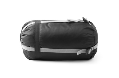 Case with sleeping bag on white background. Camping equipment