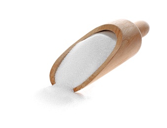 Photo of Wooden scoop with salt isolated on white