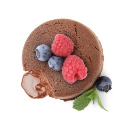 Photo of Delicious chocolate fondant, berries and mint isolated on white, top view
