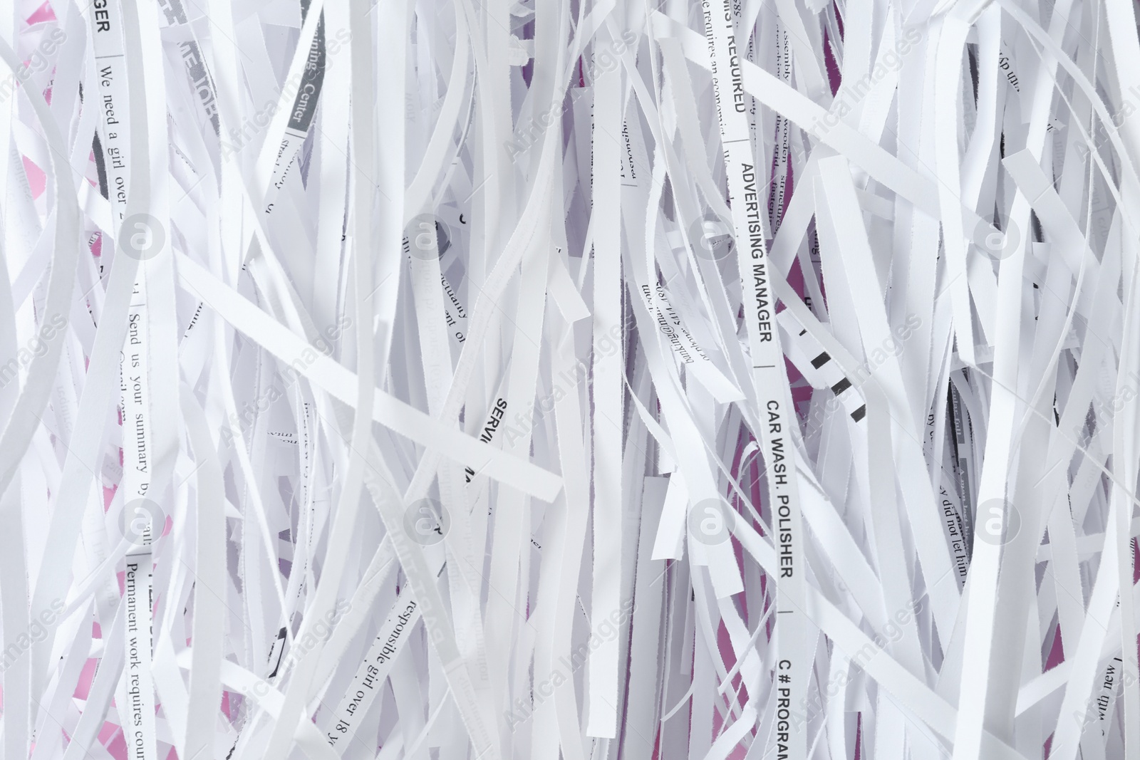 Photo of Heap of shredded paper strips as background, top view
