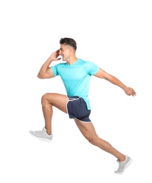 Handsome young man running on white background