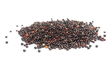 Photo of Pile of black quinoa on white background