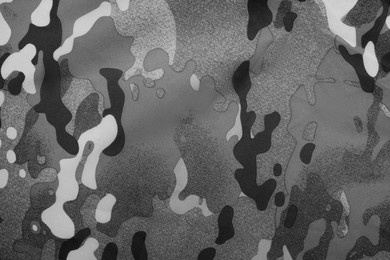 Image of Texture of camouflage fabric as background, top view. Black and white effect