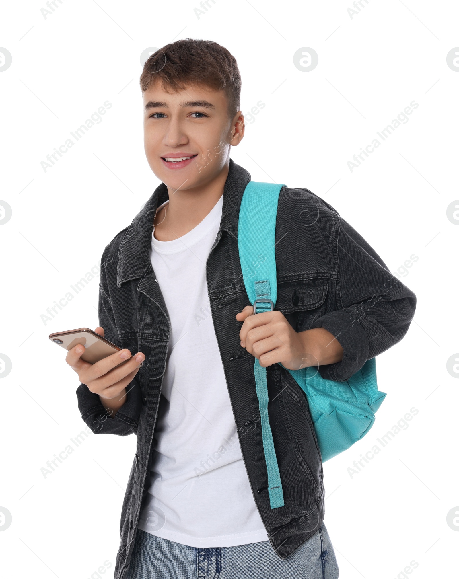 Photo of Teenage boy with backpack using smartphone on white background