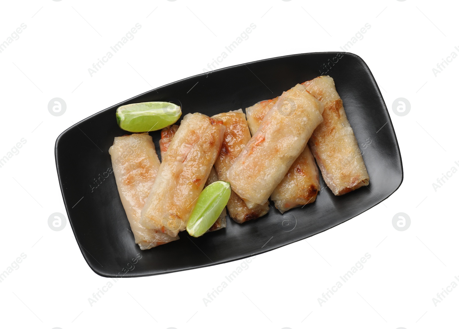 Photo of Tasty fried spring rolls and lime isolated on white, top view