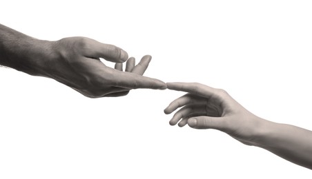Man and woman touching each other on white background, closeup view of hands. Black and white effect