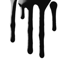 Photo of Black glossy oil flowing on white background