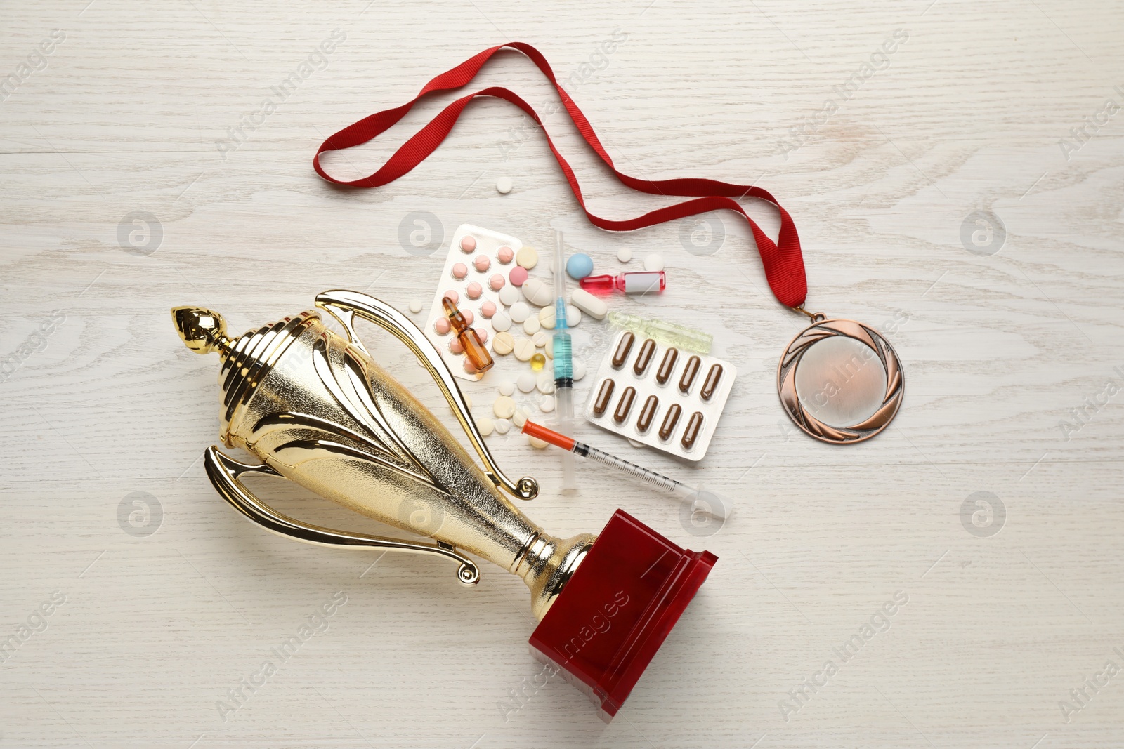 Photo of Flat lay composition with drugs on white wooden table. Doping control