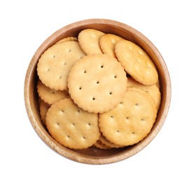 Tasty crackers in bowl isolated on white, top view