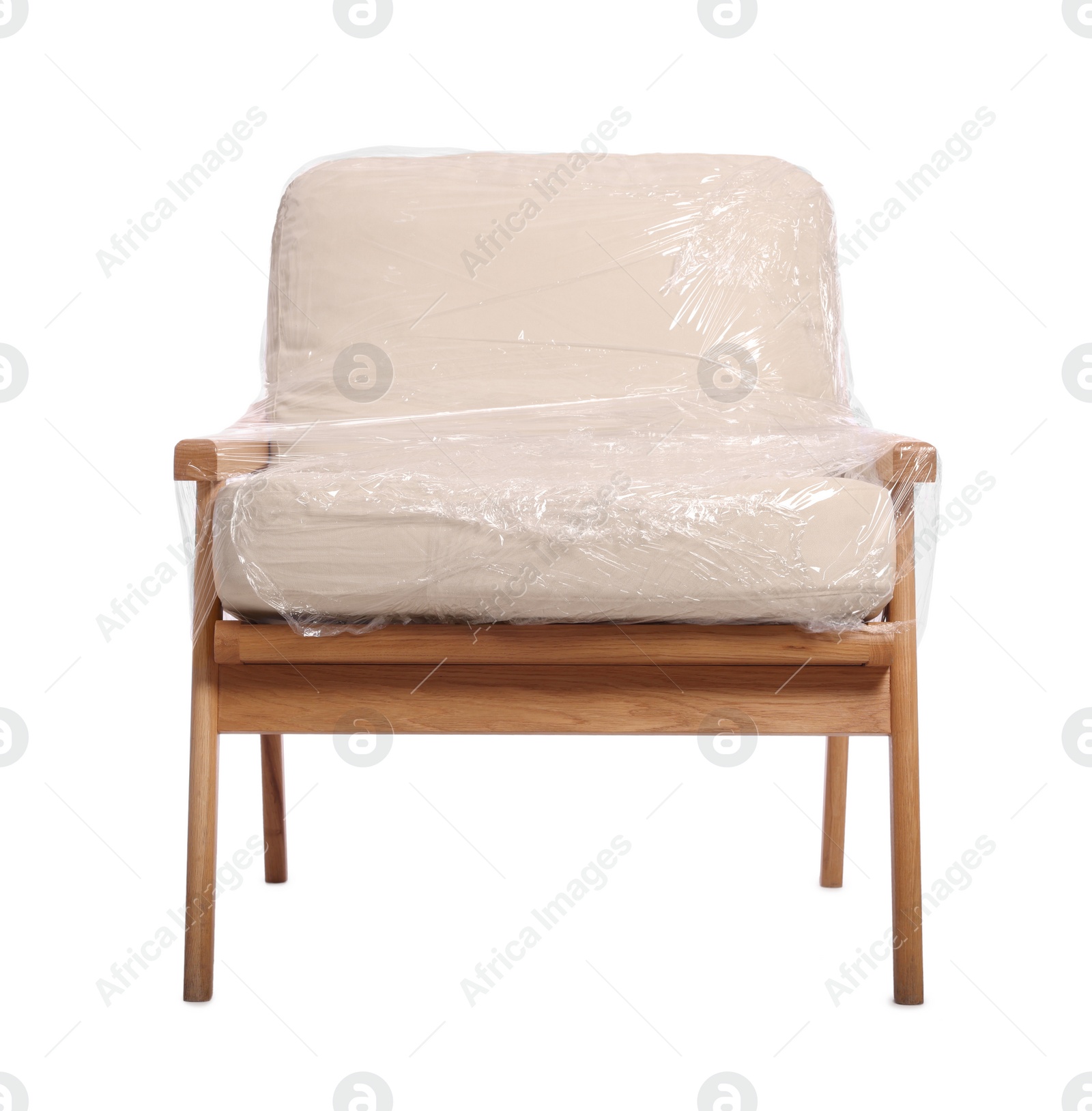 Photo of Armchair wrapped in stretch film on white background