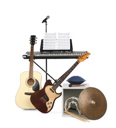 Photo of Set of different musical instruments and microphone 
on white background