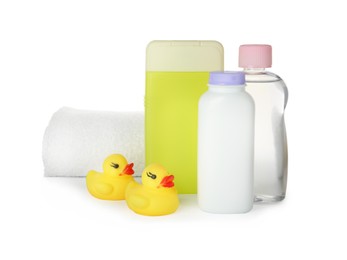 Set of baby cosmetic products, towel and rubber ducks on white background