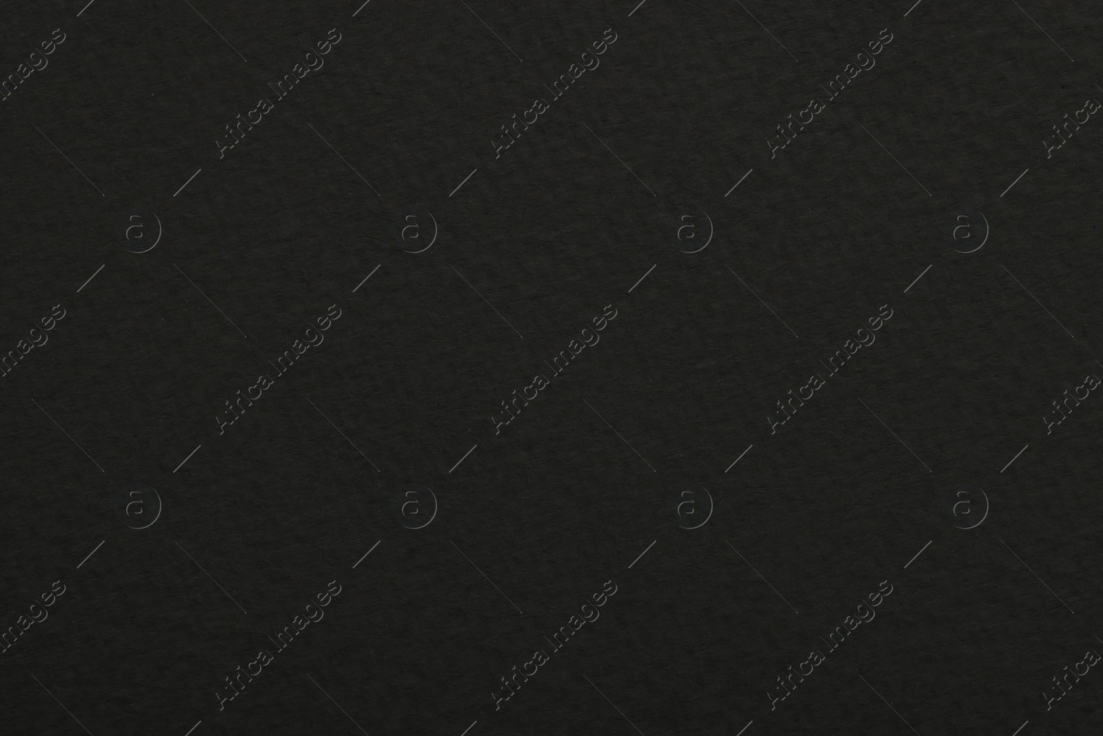 Photo of Texture of black paper sheet as background, top view