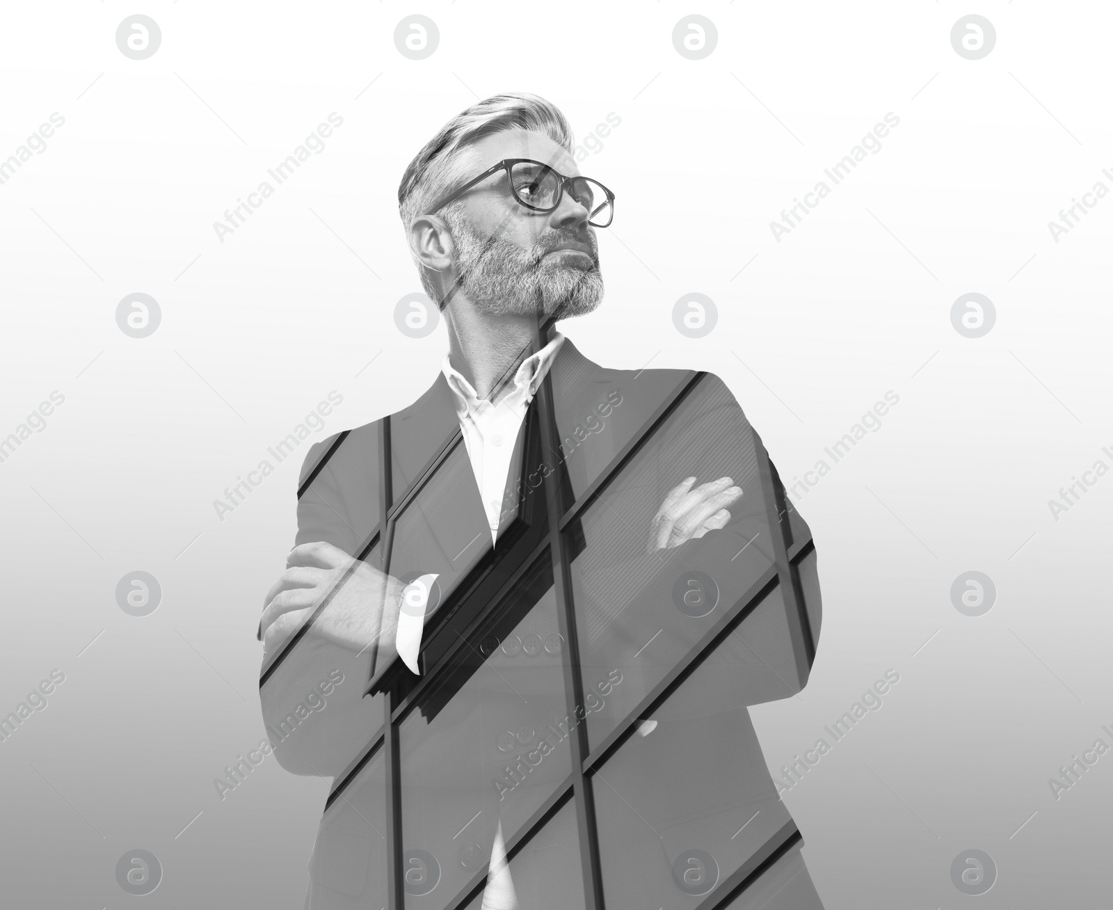 Image of Double exposure of businessman and office building