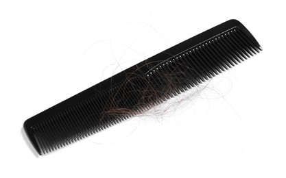 Photo of Comb with lost hair isolated on white