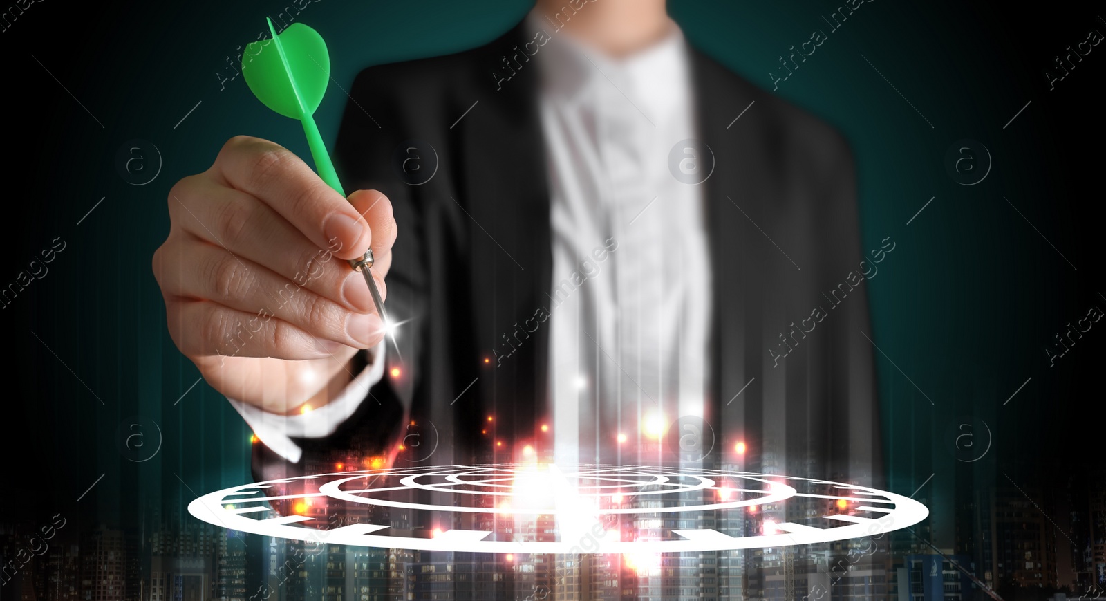 Image of Businesswoman aiming at digital target with dart against dark background, closeup