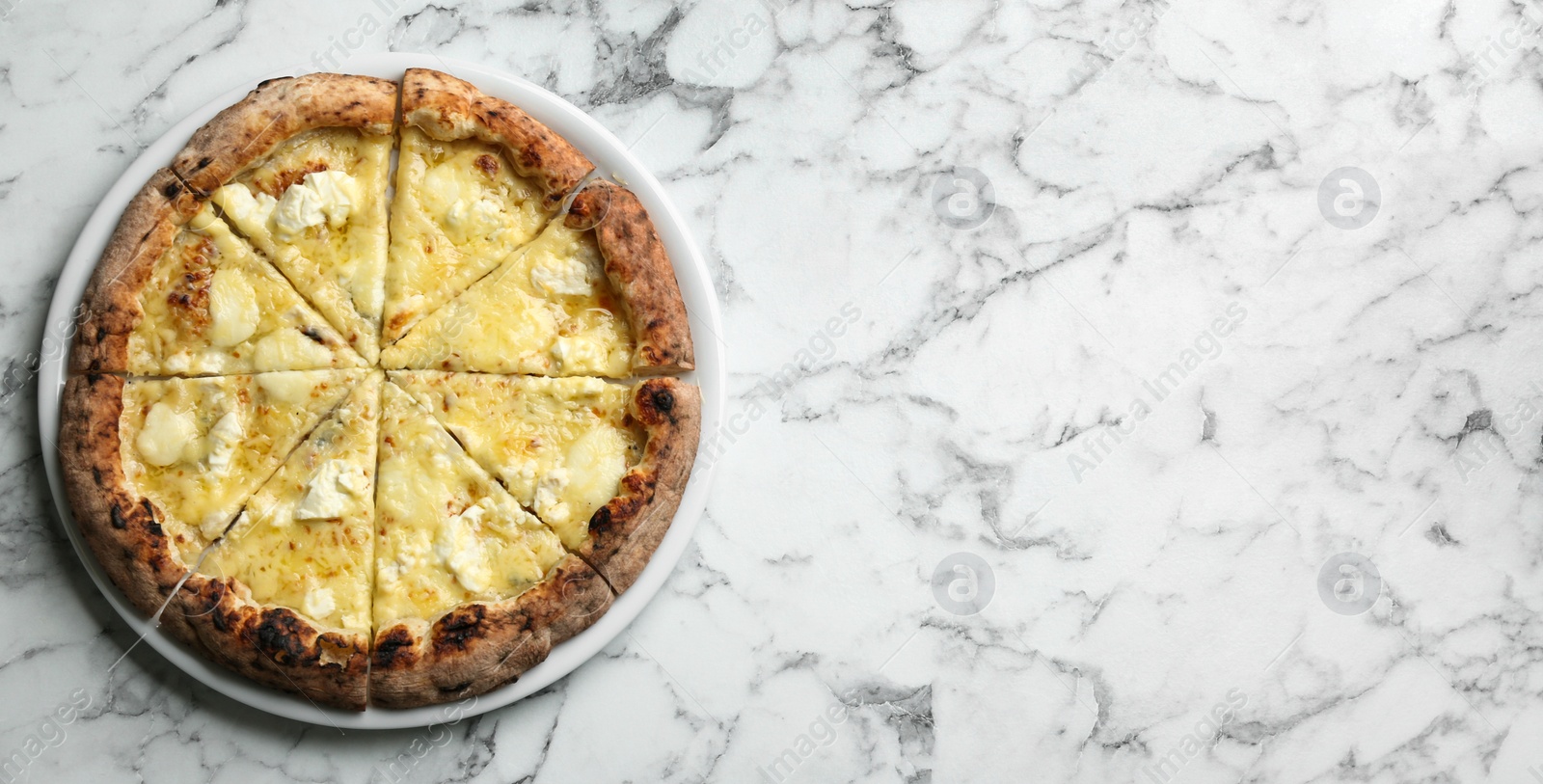 Photo of Tasty cheese pizza on white marble table, top view. Space for text