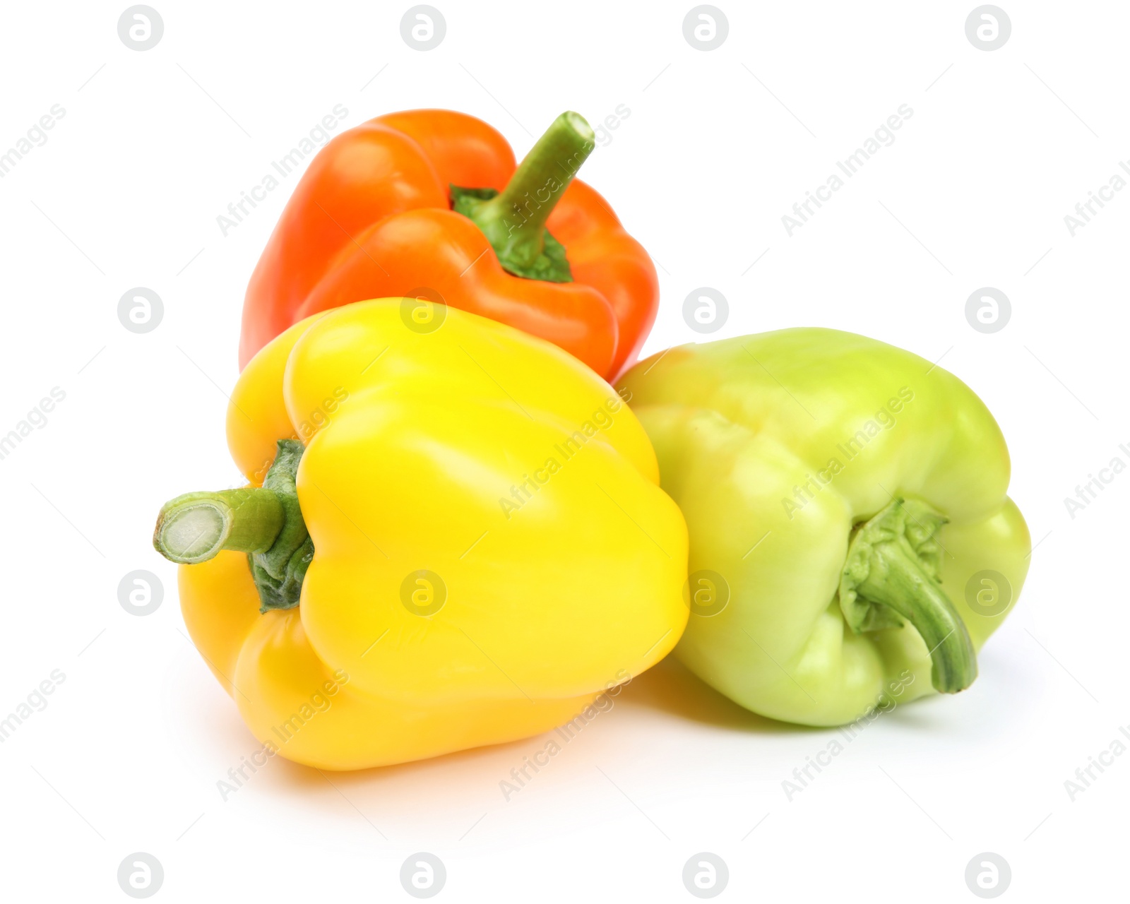 Photo of Fresh ripe bell peppers on white background