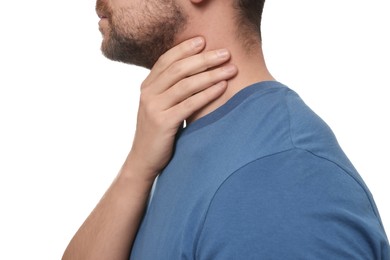 Photo of Man suffering from sore throat on white background, closeup