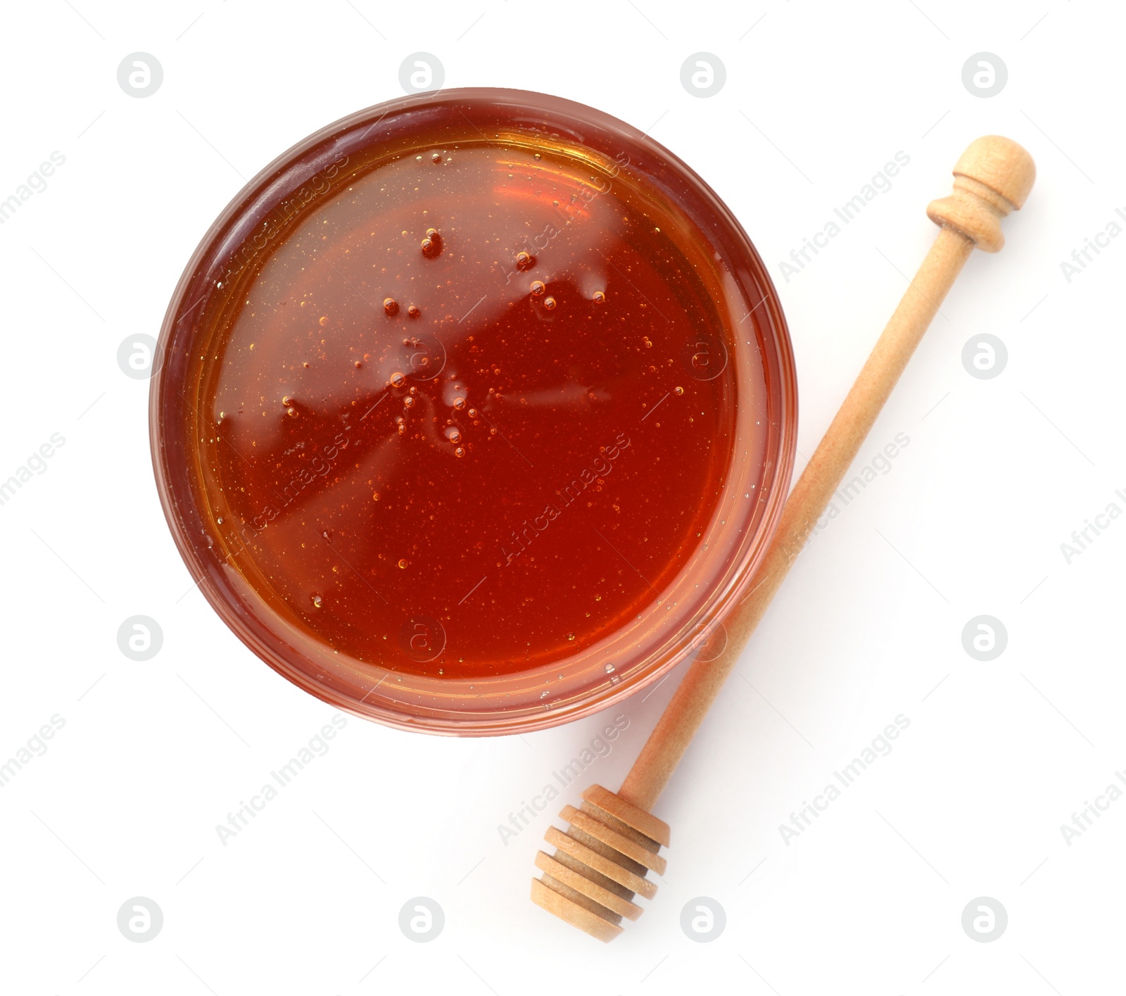 Photo of Jar with delicious honey and dipper on white background, top view