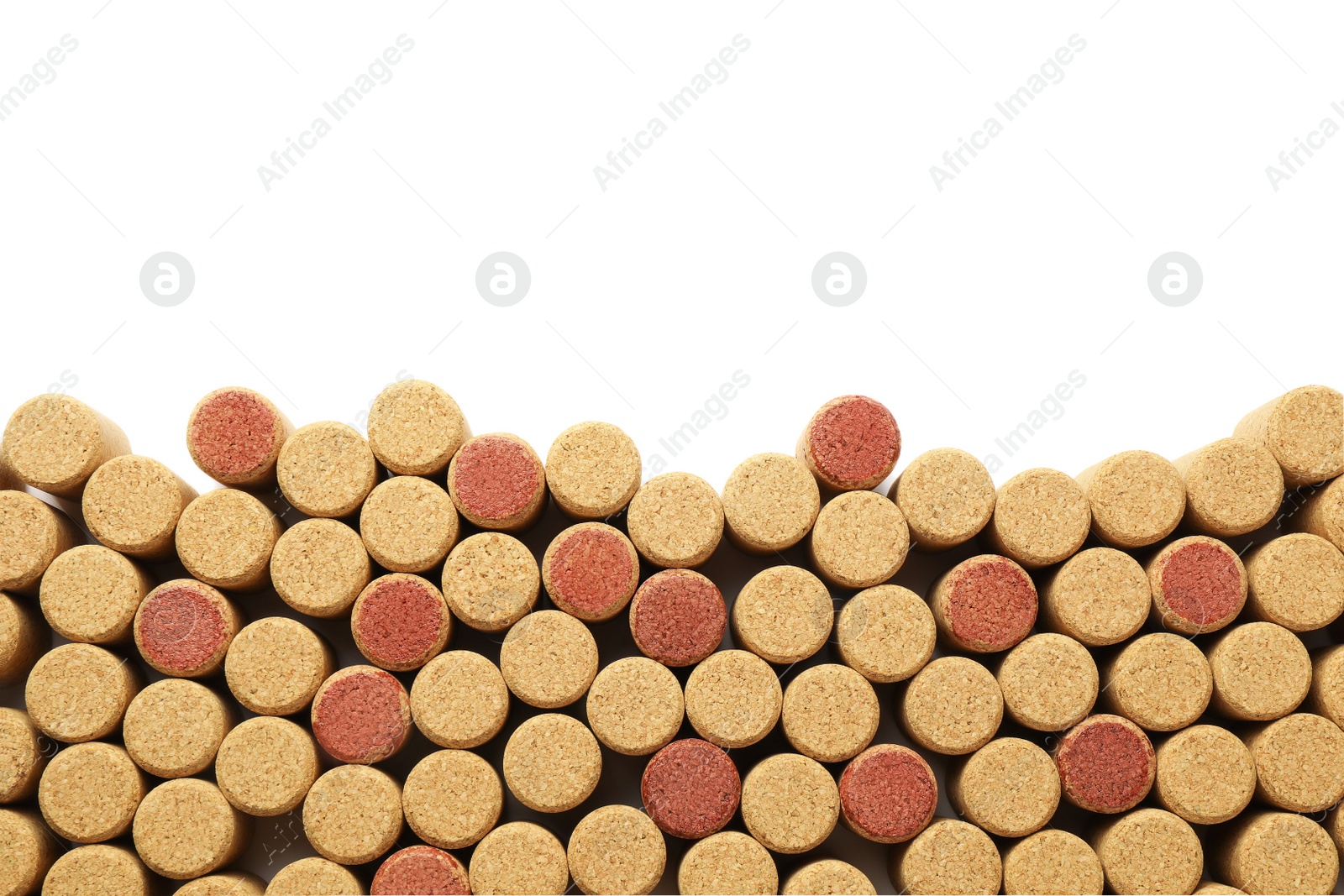 Photo of Wine bottle corks on white background, top view