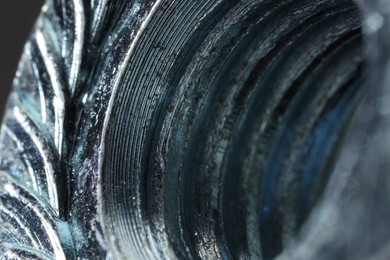 Photo of Texture of modern metal fastener, macro view