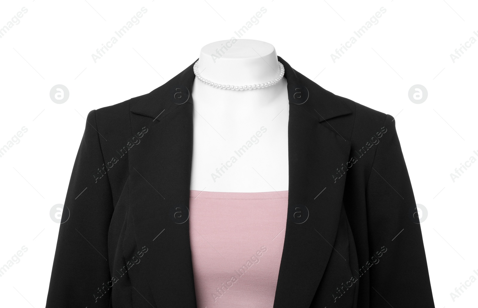 Photo of Female mannequin dressed in black jacket and crop top with necklace isolated on white. Stylish outfit