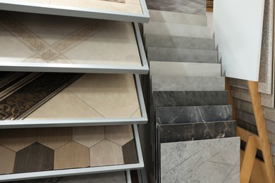 Many samples of tiles on display in store