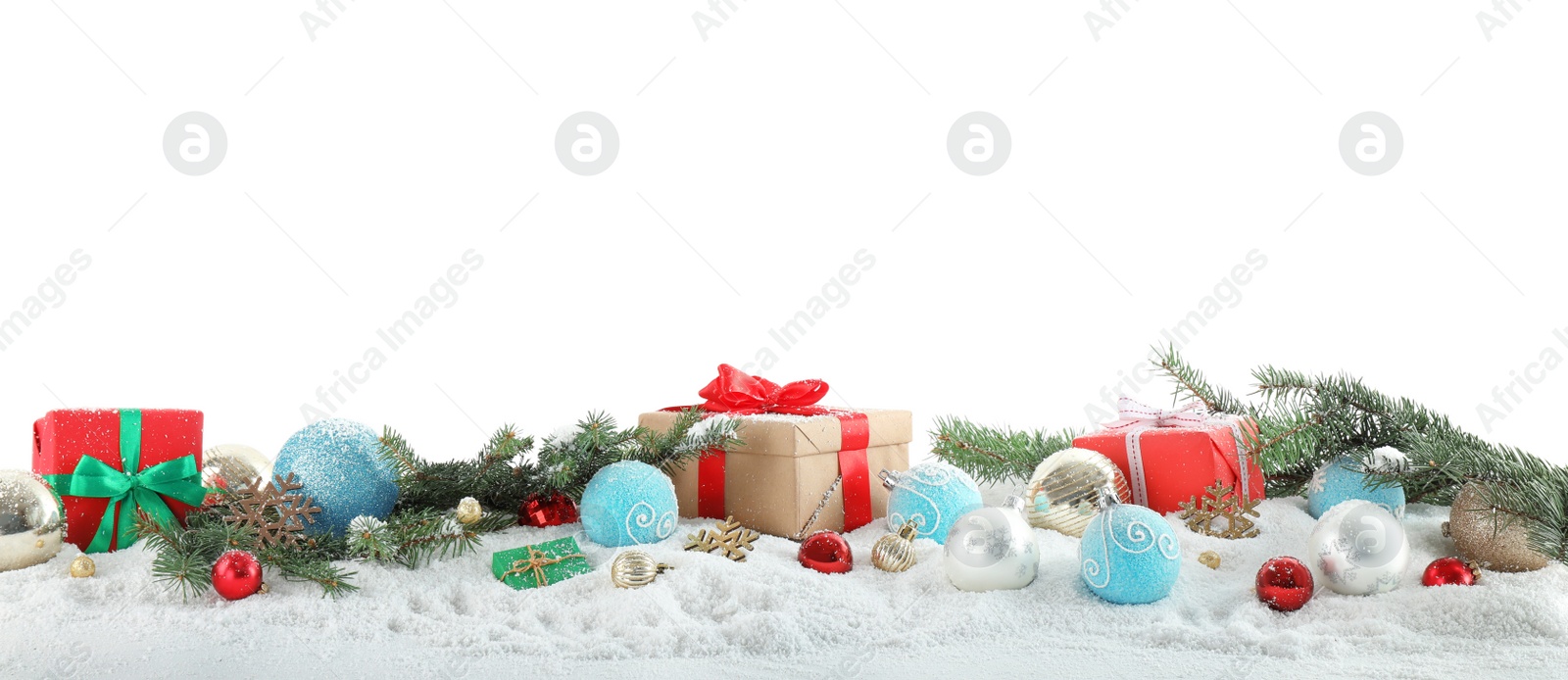 Photo of Fir branches, Christmas decoration and snow against white background