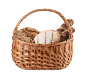 Photo of Wicker basket with different types of fresh bread isolated on white