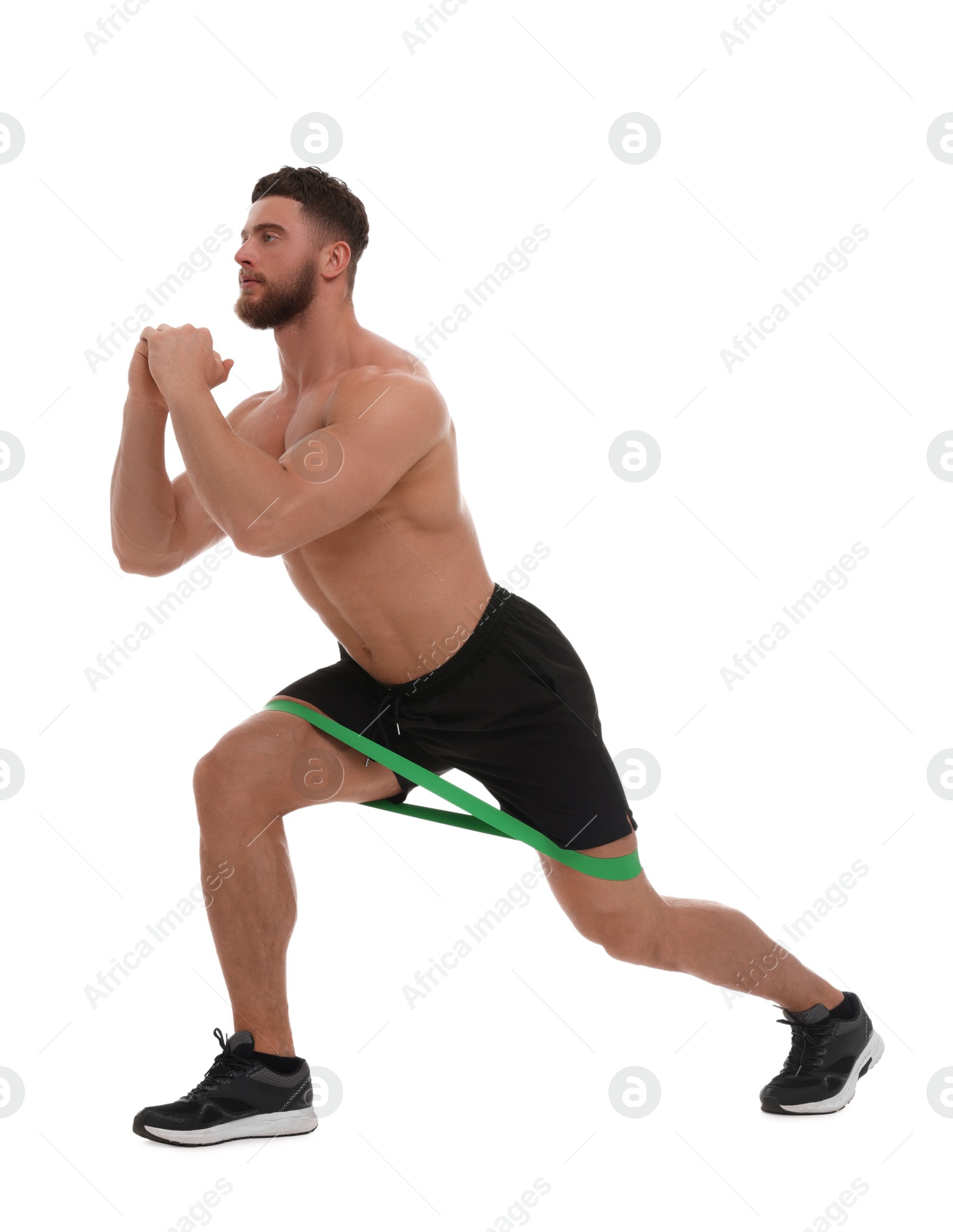 Photo of Young man exercising with elastic resistance band on white background