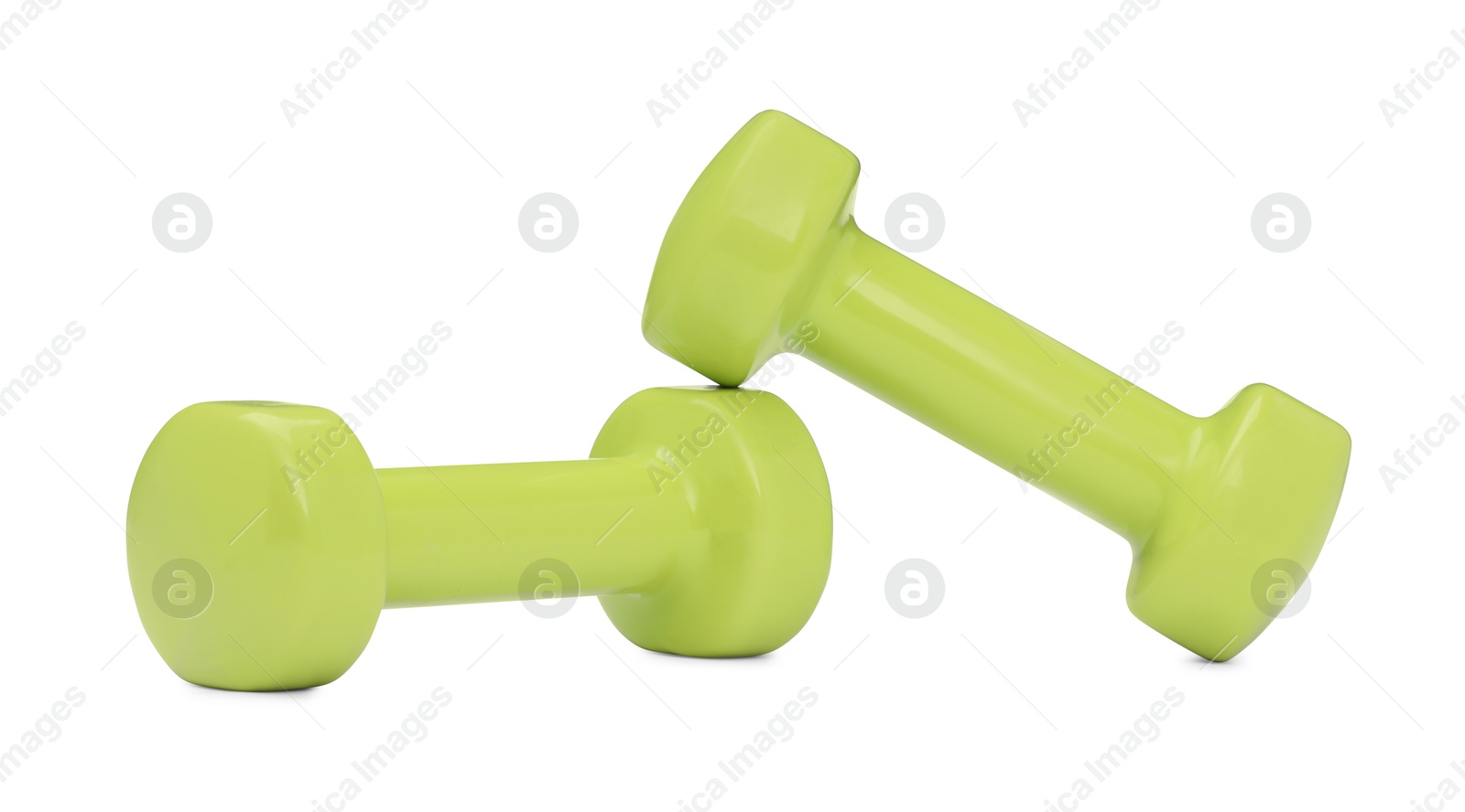 Photo of Light green dumbbells isolated on white. Sports equipment