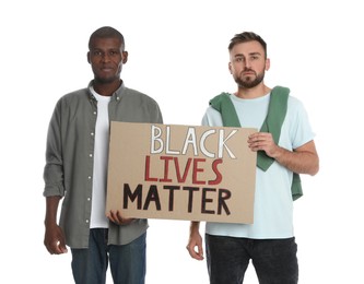 Photo of Men holding sign with phrase Black Lives Matter on white background. Racism concept