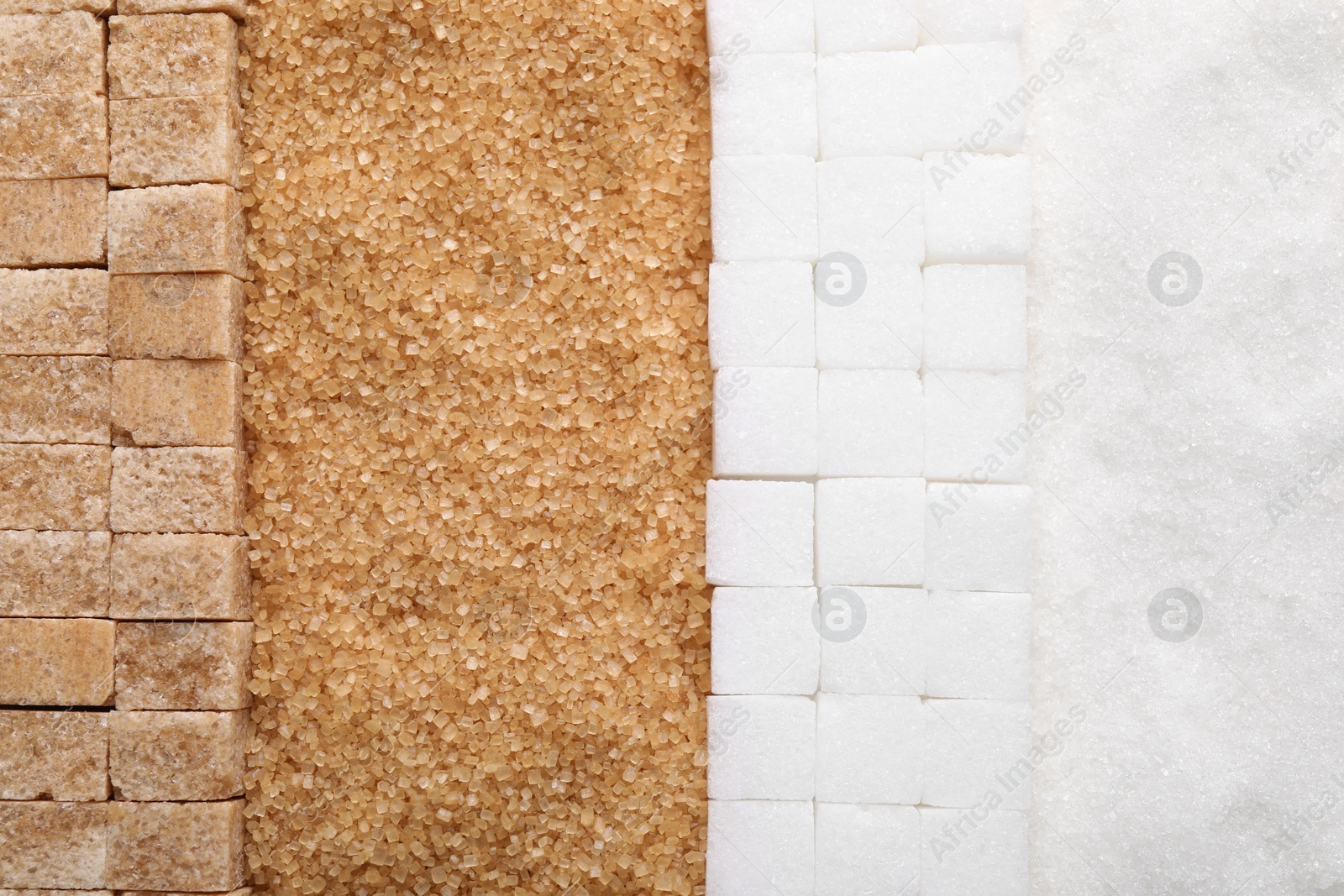 Photo of Different types of sugar as background, top view